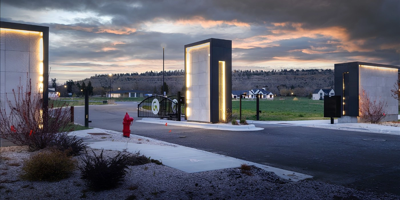 Illuminated entrance gates at Glynn Abbey in Billings